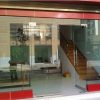 Cửa kính cường lực - cửa bản lề sàn 2 cánh