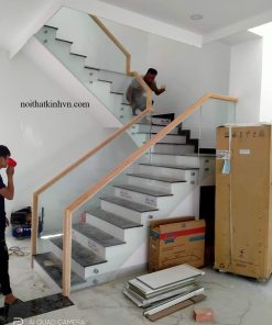 Cầu thang kính không trụ tay vịn tròn