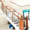 Cầu thang kính trụ gỗ inox 304