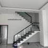 Cầu thang kính trụ lửng trụ tròn phi 38