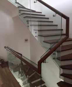 Cầu thang kính không trụ tay vịn tròn đi hông 2