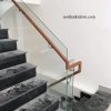 Cầu thang kính không trụ tay vịn đi hông tròn 50