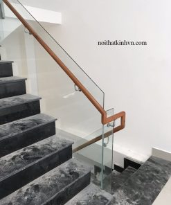 Cầu thang kính không trụ tay vịn đi hông tròn 50
